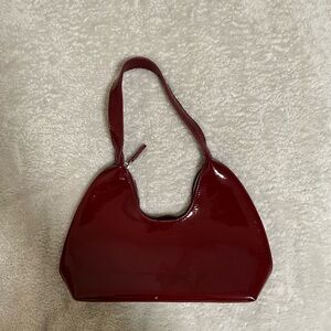 Red Textured Shoulder Bag with Crescent Shape